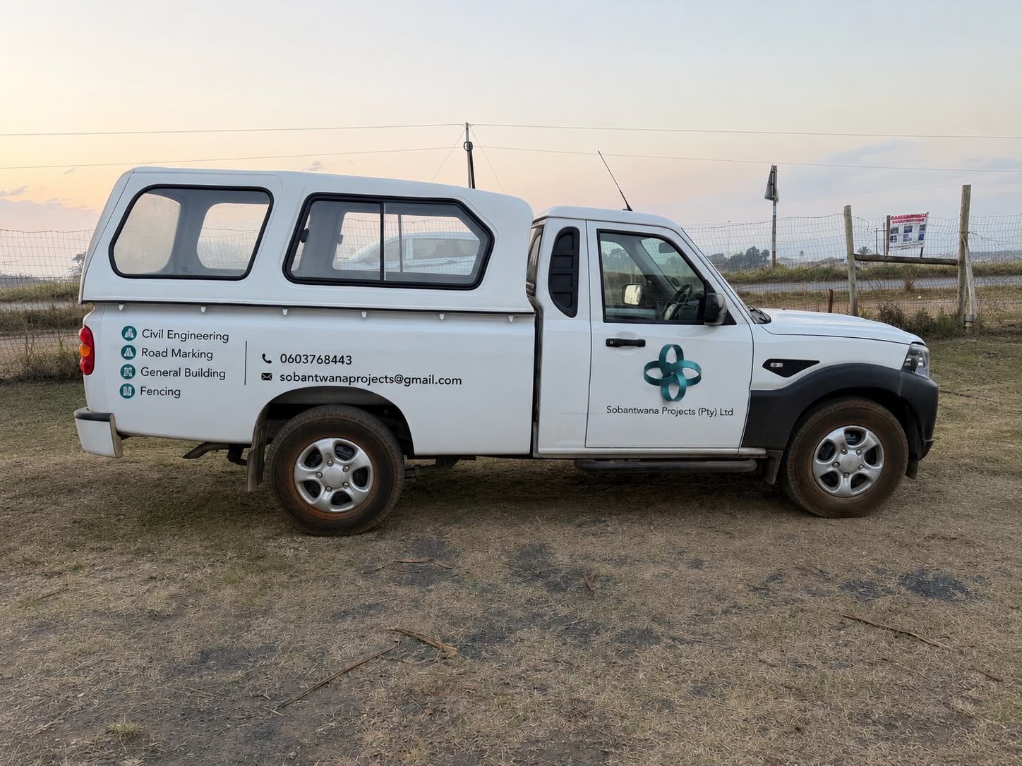 Sobantwana Projects fleet vehicle branded with civil engineering, road marking, general building and fencing services